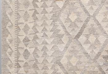 A kilim carpet, c 287 x 208 cm.