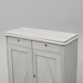 A mid 19th Century painted cupboard.