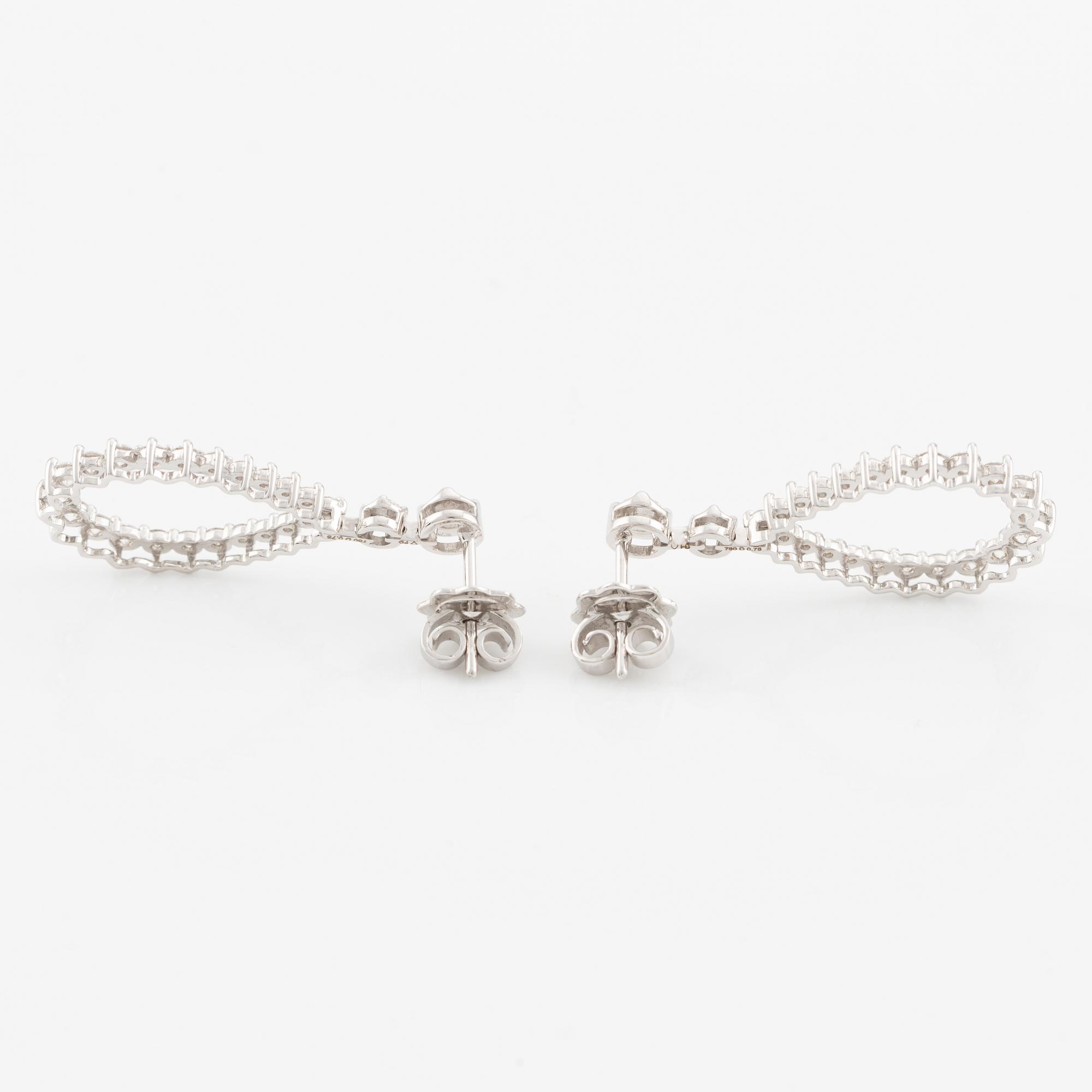 Drop-shaped earrings with brilliant-cut diamonds.