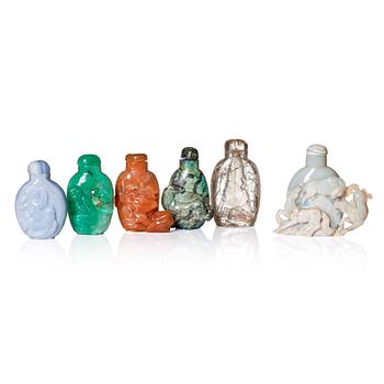 1026. A set of six Chinese sculpted snuff bottles, 20th Century.
