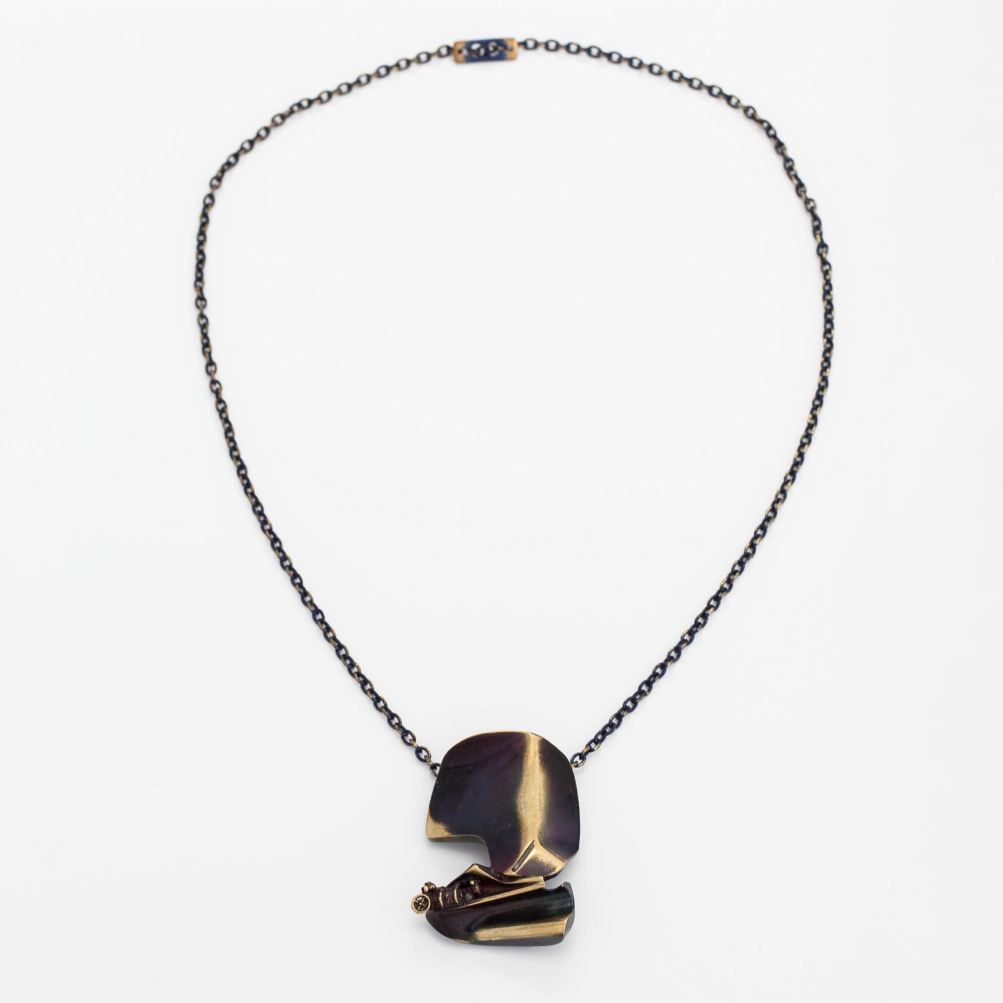 Björn Weckström, A flame bronze necklace "International arms Inc" and ring "Henry J". Lapponia.