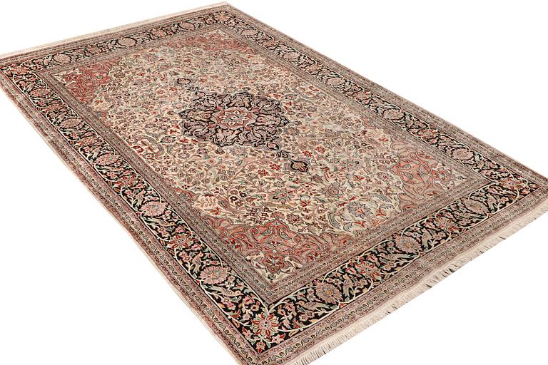 A carpet, silk Kashmir, c. 279 x 180 cm.