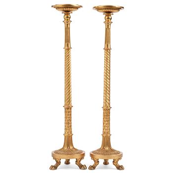 58. A pair of late Gustavian giltwood torchères by J. Frisk (master in Stockholm 1805-24).