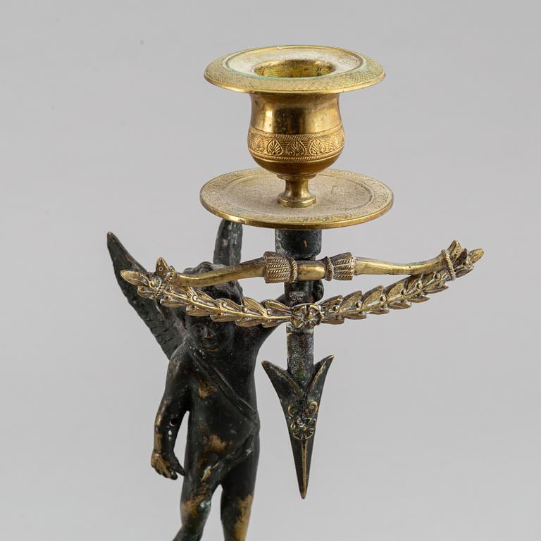 A pair of Empire candlesticks, first half of the 19th-century.