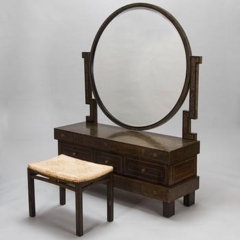 A 1930's dressing table and a stool.