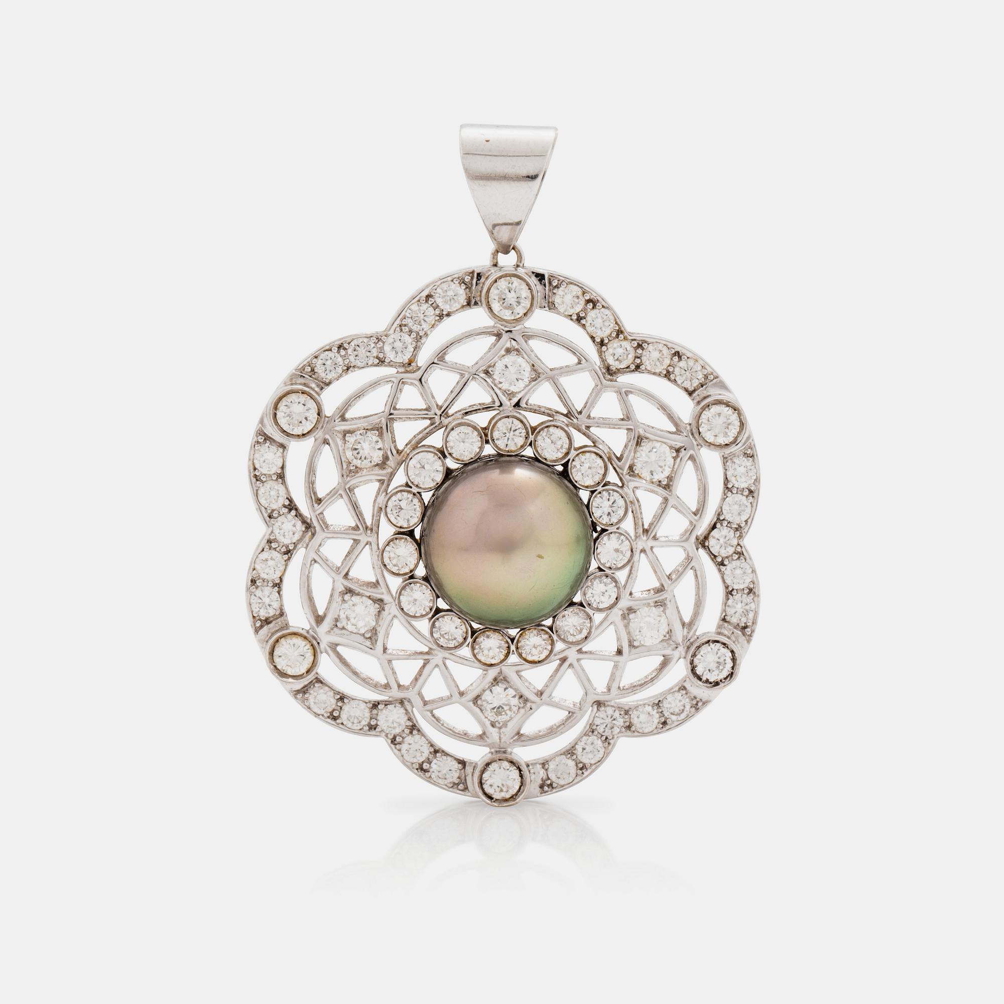 A cultured Tahiti pearl and brilliant cut diamond pendant. Total carat weight of diamonds circa 4.50 cts.