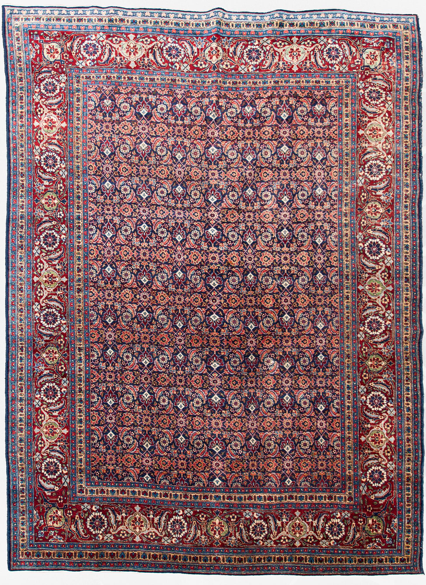 A carpet, a semi-antique Tabriz, ca 357 x 255 cm.