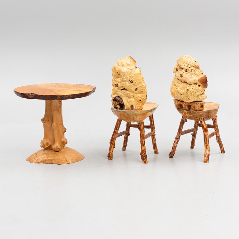 A burl table and a pair of burl chairs, Sweden, 20th century.