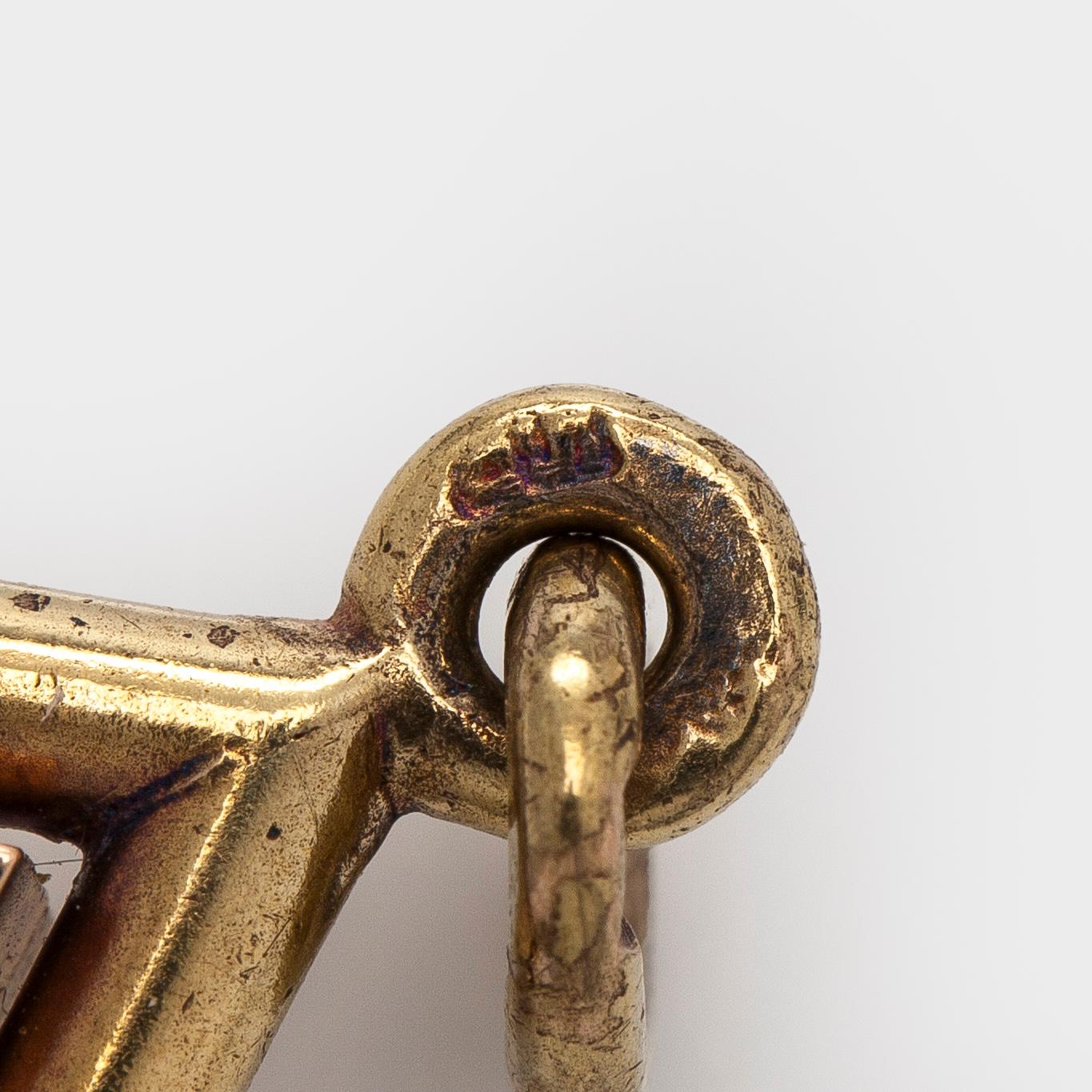 Medaljong, fasettslipad rubin, rosenslipade diamanter, 14K (56) guld, Ryssland 1908-1926.