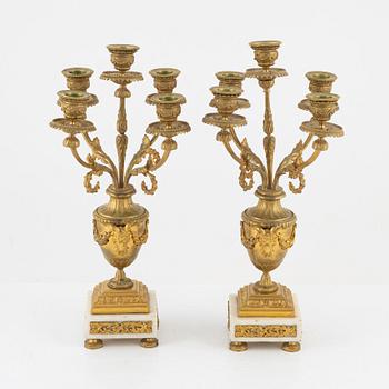 A pair of Louis XVI-style style candelabras, early 20th century.