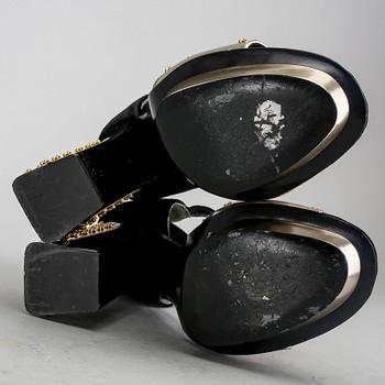 Alexander McQueen, a pair of shoes.