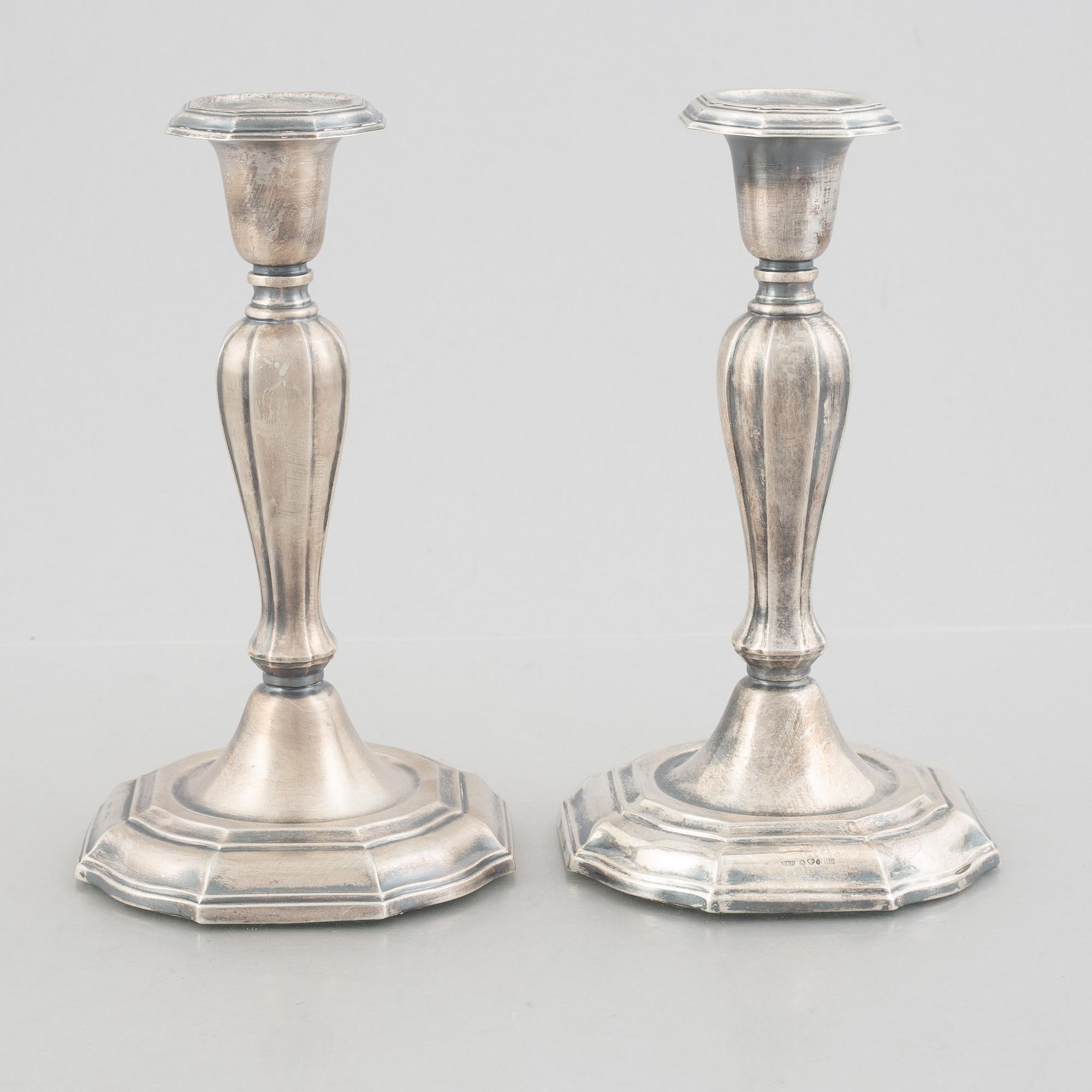 Two pairs of Swedish silver candlesticks, including Eric Löfman, MGAB, Uppsala 1979-1982.