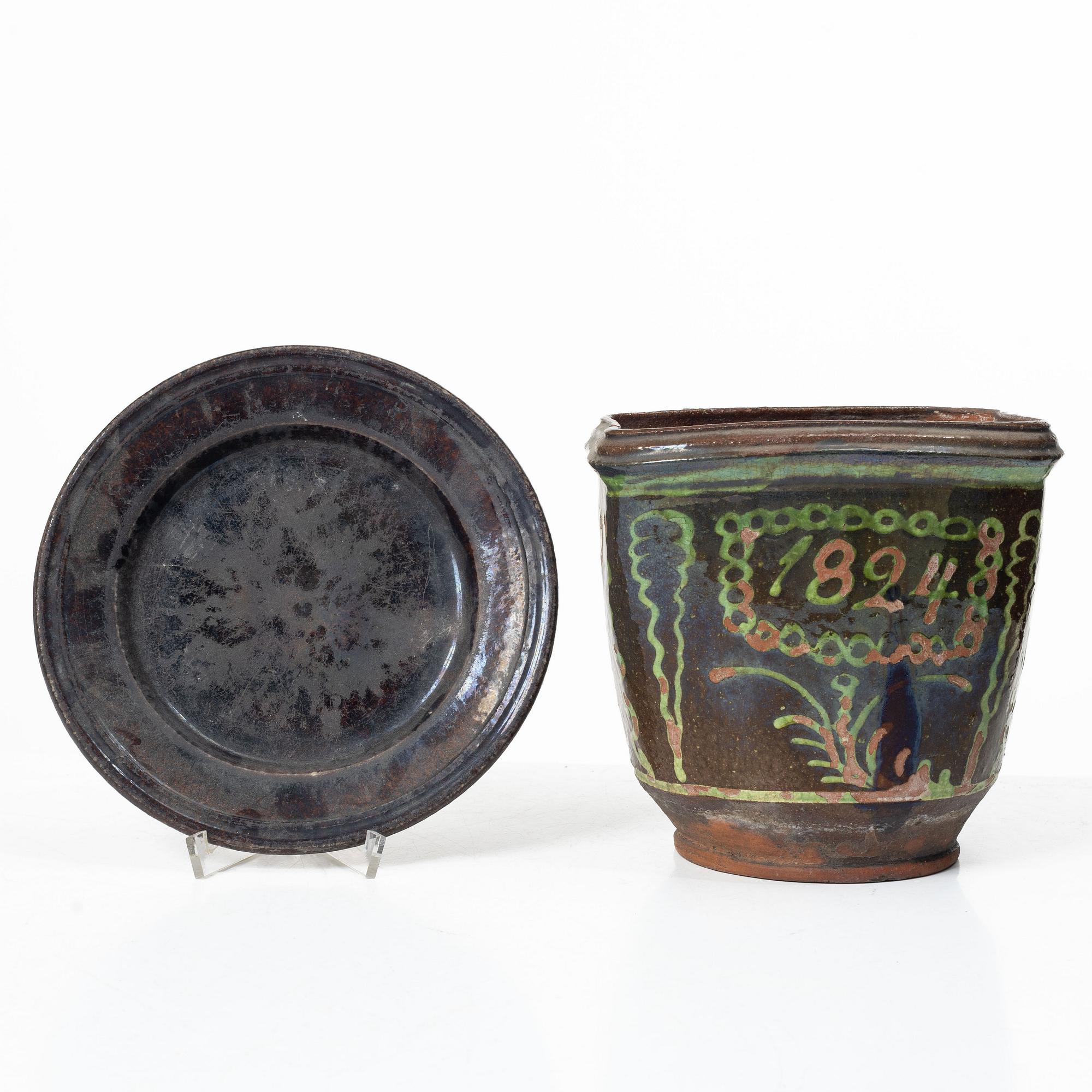 Stoneware planter and stand, dated 1824.