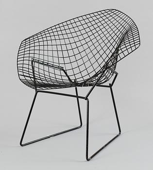 A Harry Bertoia black metal "Diamond chair".