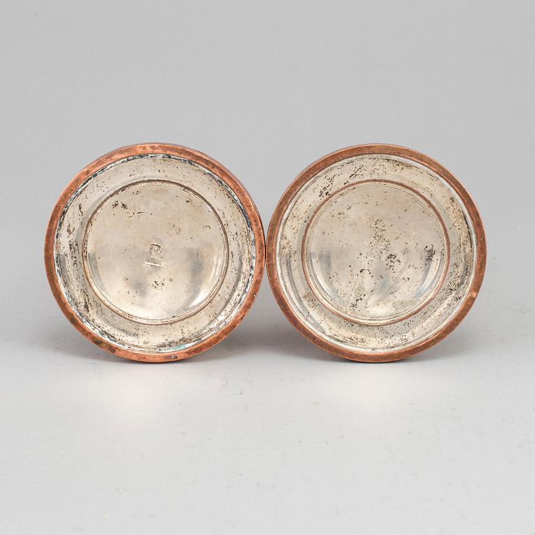 A pair of English early 19th century candlesticks.