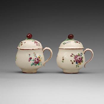 1402. A pair of Swedish soft paste custard cups with covers, Marieberg, 18th Century.