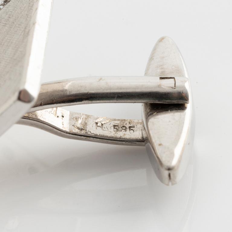 Cufflinks, a pair, white gold with brilliant-cut diamonds.