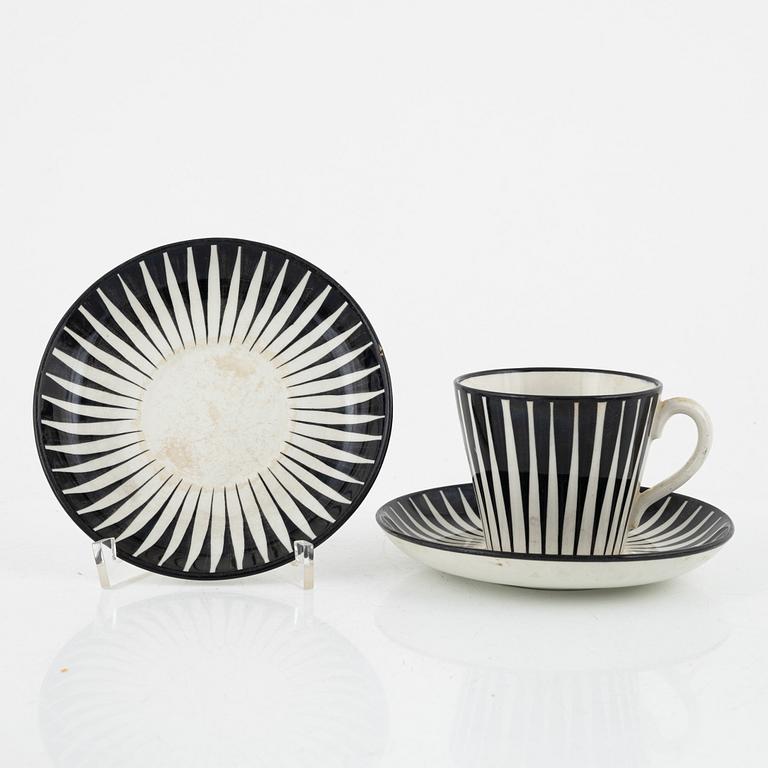 Eugen Trost, eleven coffee cups with three saucers, 'Zebra', Upsala-Ekeby Gefle.