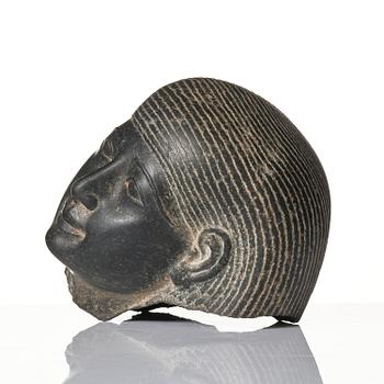 An Egyptian basalt head of a man, Grand tour, 19th century.
