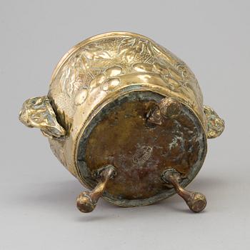 A 19TH CENTURY BRASS FLOWER POT.