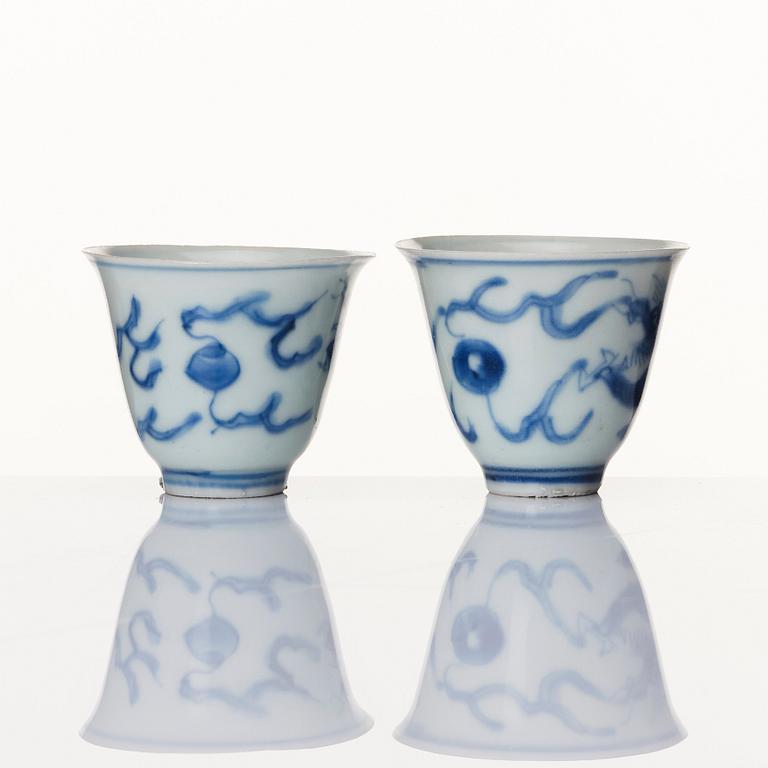 A set of two blue and white wine cups, Ming dynasty, Transition/Chongzhen (1628-44).