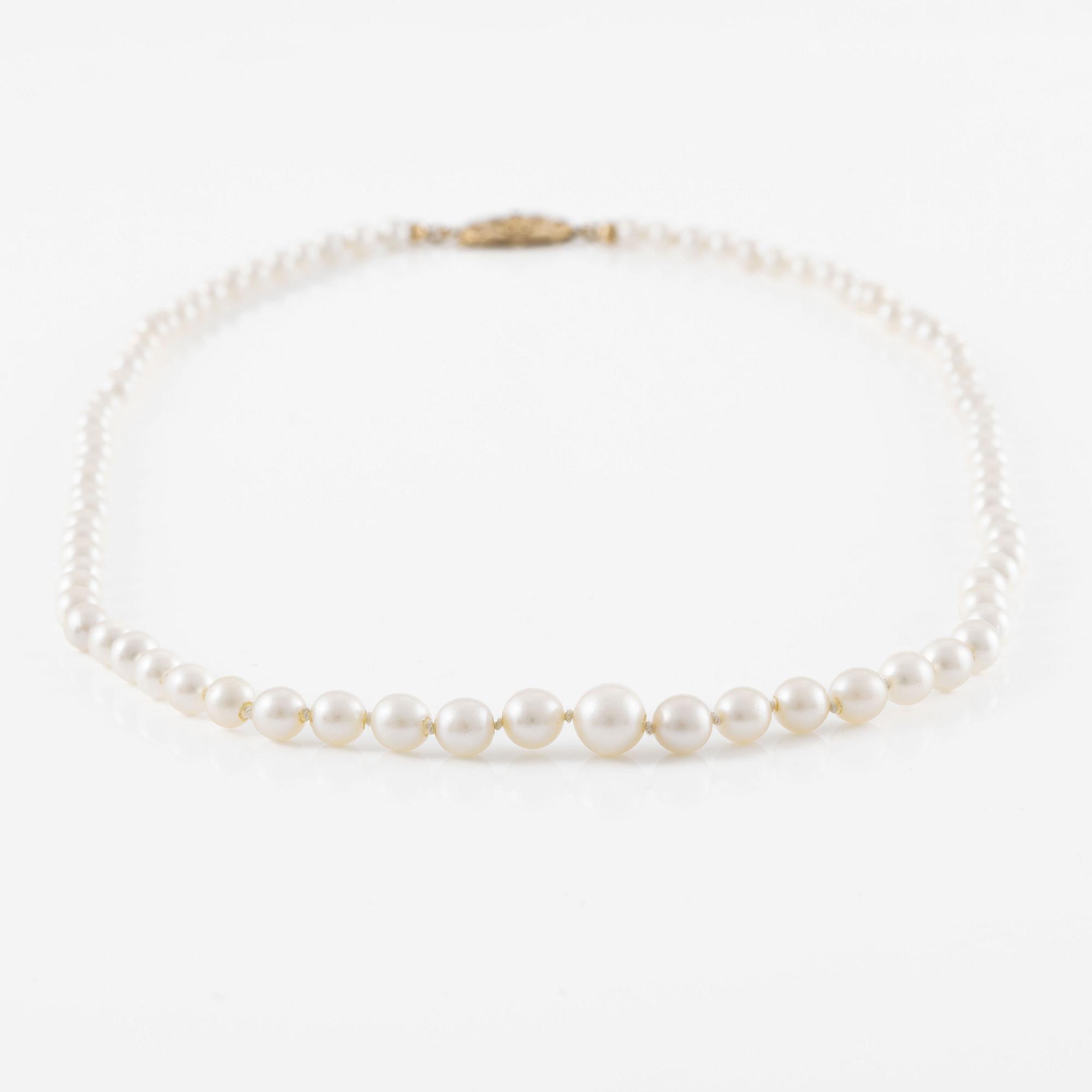 Pärlcollier, doserat med odlade pärlor, med lås i 18K guld.