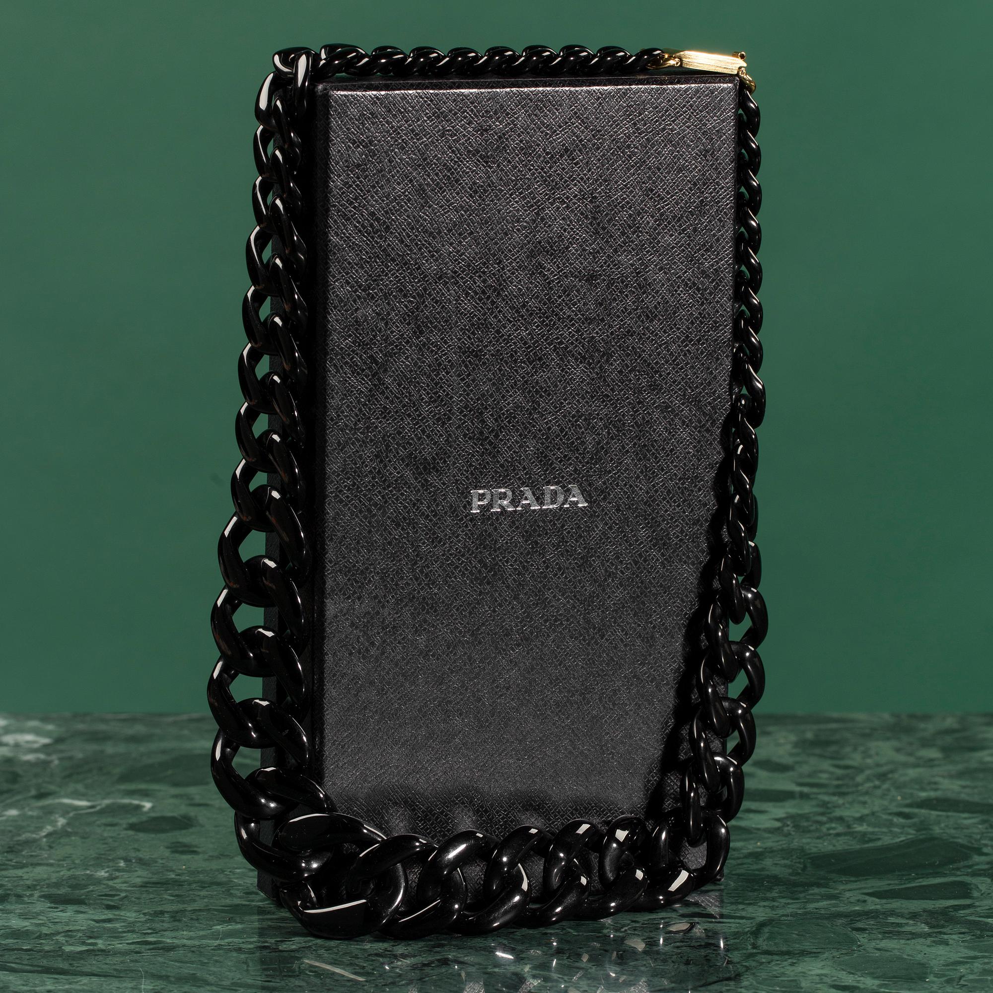 A necklace by PRADA.