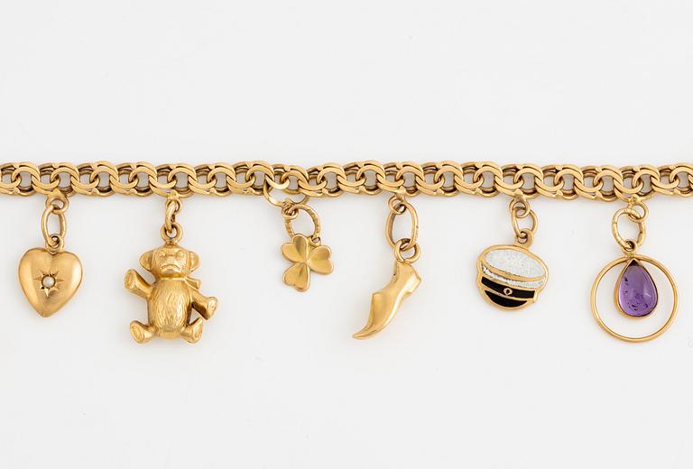 Bracelet, with charms, 18K gold.