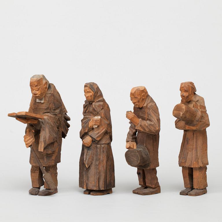 Axel Petersson Döderhultarn, "Begravning" (= The funeral) (9 pieces).