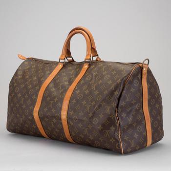 A monogram canvas "Keepall Bandouliére 55" from Louis Vuitton.