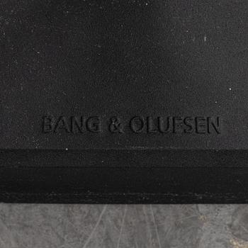 Bang & Olufsen, a 'BeoSound 9000 MK2', and a pair of floor speakers.