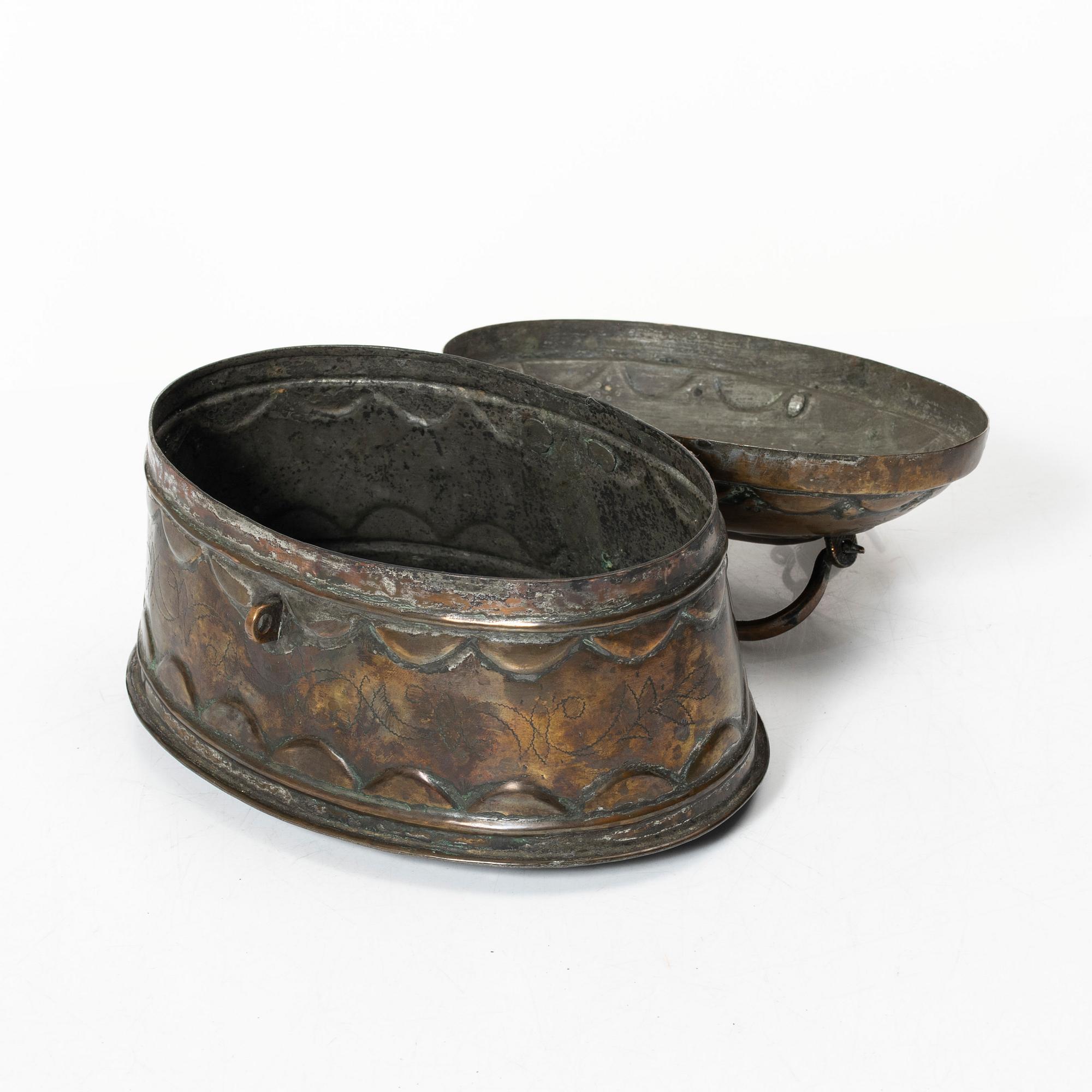 A Swedish baroque repousse copper box, 18th century.