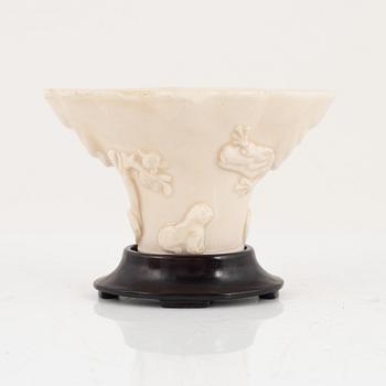 A blanc de chine libation cup, Qing dynasty.