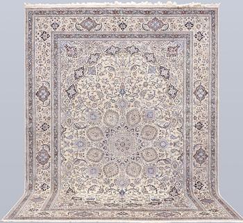 An olker part silk Nain carpet, 364 x 259 cm.