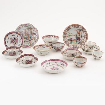 A group of seven famille rose cups with saucers, two bowls and two small dishes, Qing dynasty, Qianlong (1736-95).