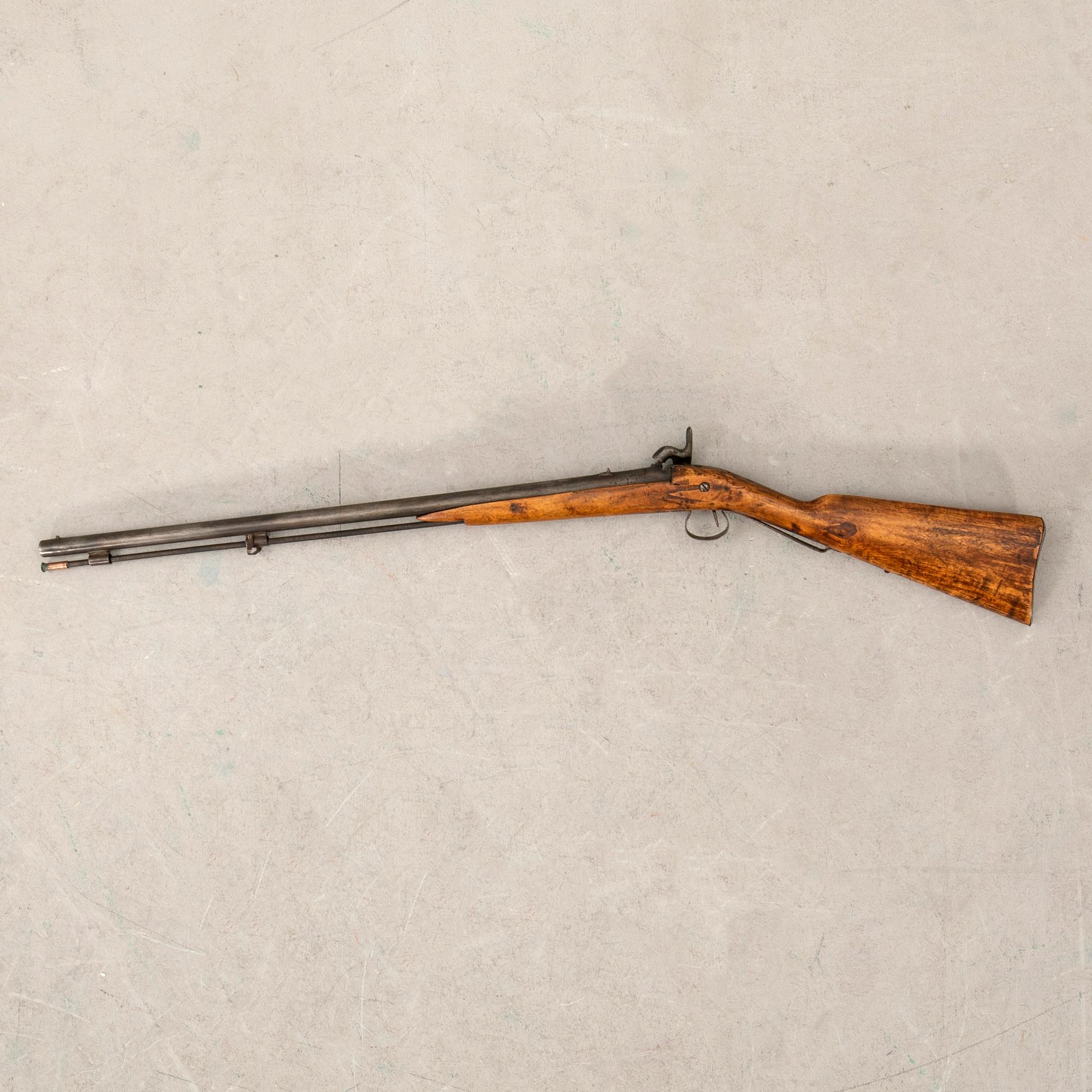 A percussion gun., Swedish,.