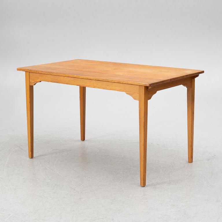 Carl Malmsten, dining table and four chairs, including Svensk Fur, second half of the 20th century.