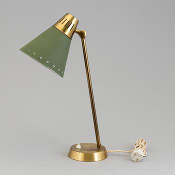 A mid 20th century table lamp by Einar Bäckström.