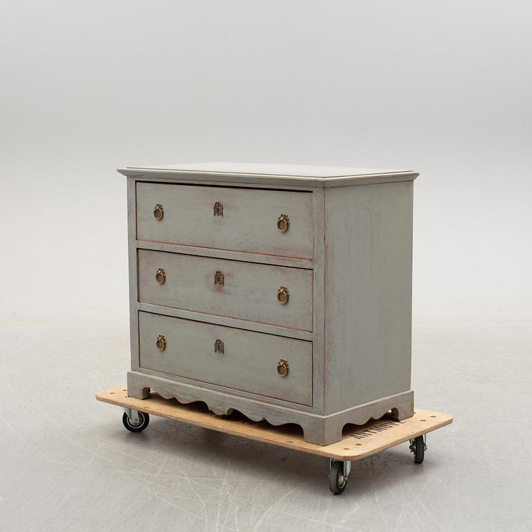 A mid 19th century painted chest of drawers.