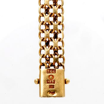 An 18K gold Favre-Leuba wristwatch.