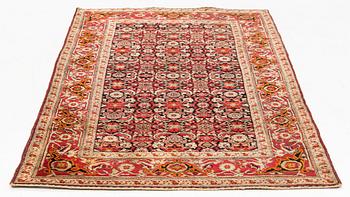 An antique Agra rug, ca 208 x 127 cm.