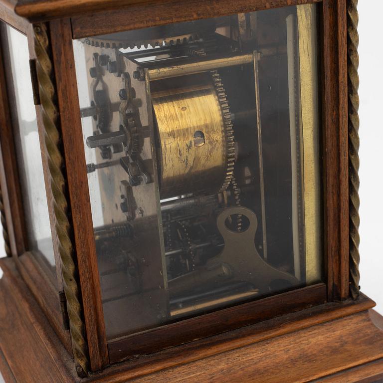 A mantle clock with a polyphon music box, around 1900.