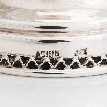 A pair of sterling silver candlesticks, latter half of the 20th century. Unidentified maker's mark.