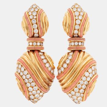 923. A pair of 18K gold Boucheron earrings set with round brilliant-cut diamonds and coral.