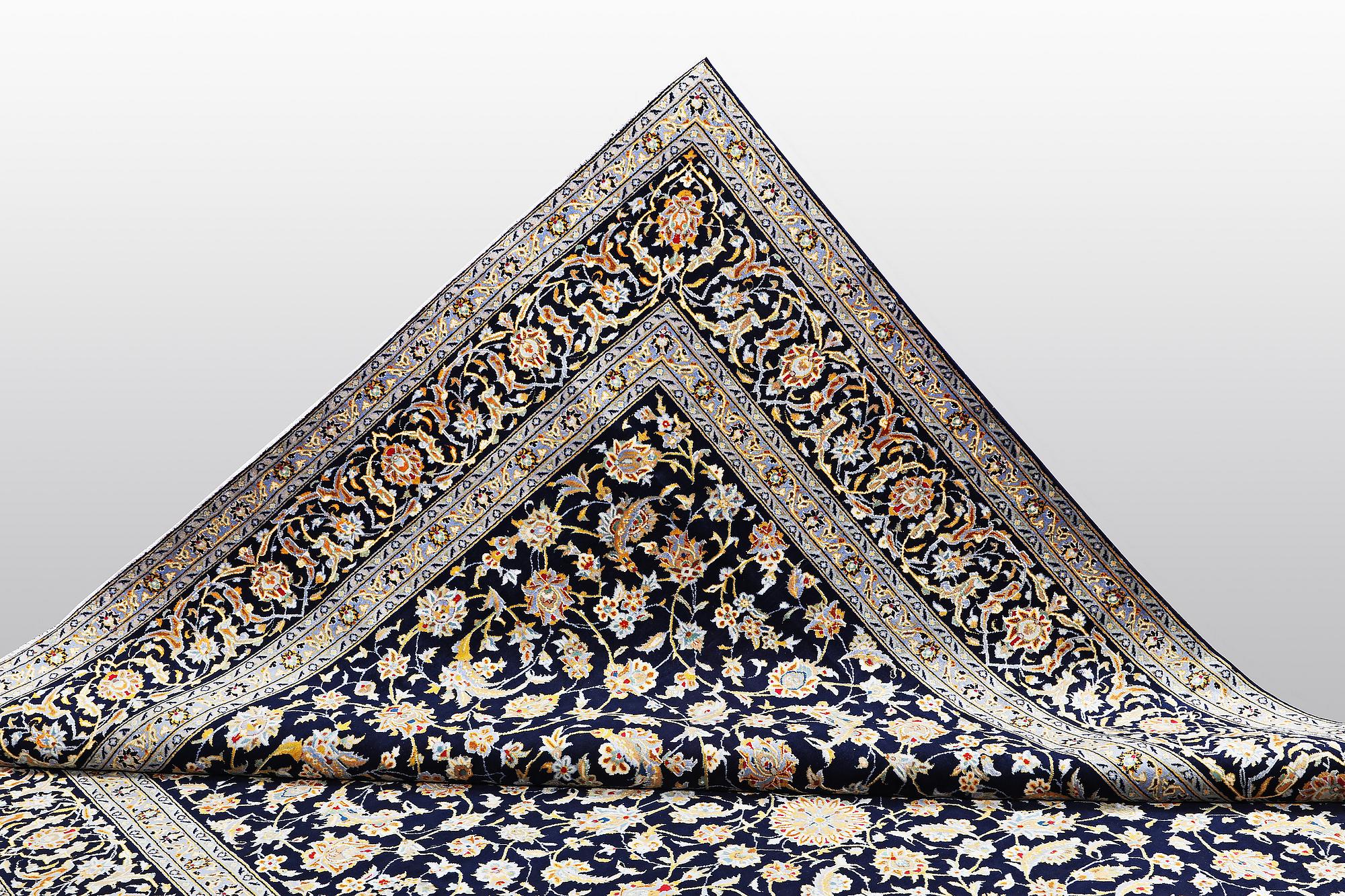 A carpet, Kashan, ca 416 x 304 cm.