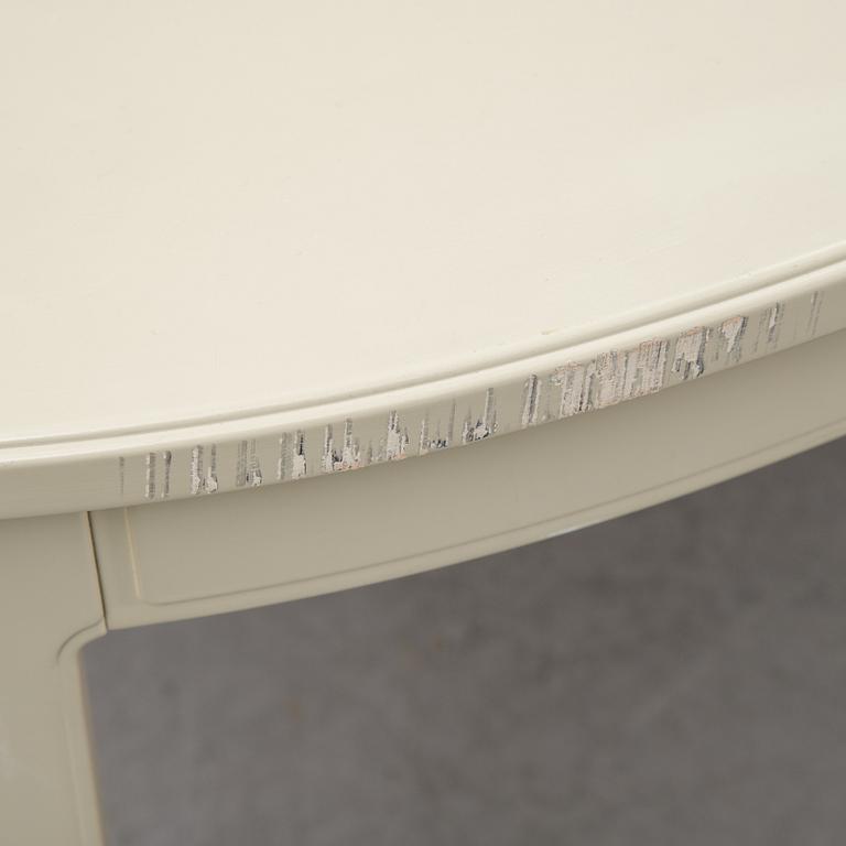 A dining table with two armchairs and six chairs by Carl Malmsten for Bodafors.