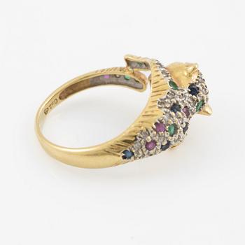 Ring, in the form of a panther, 18K gold with diamonds, sapphires, rubies, and emeralds.