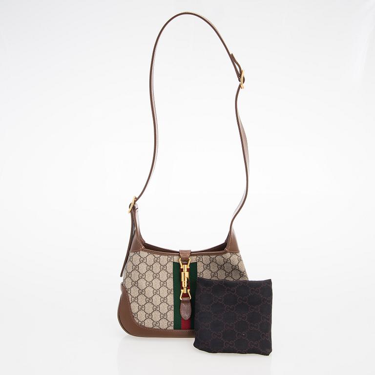 Gucci, a monogram 'Jackie' Bag.