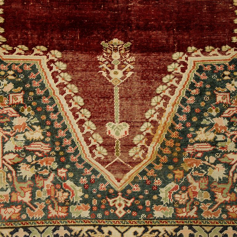 A rug, an antique Anatolia, probably Gördes (Ghiordes), a prayer rug, ca ca 188 x 124 cm.