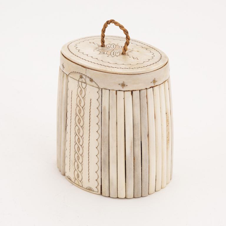 A birch box covered with engraved reindeer horn.